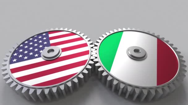 Flaggor av Usa och Italien på Meshning gears. Internationellt samarbete konceptuella animation — Stockvideo