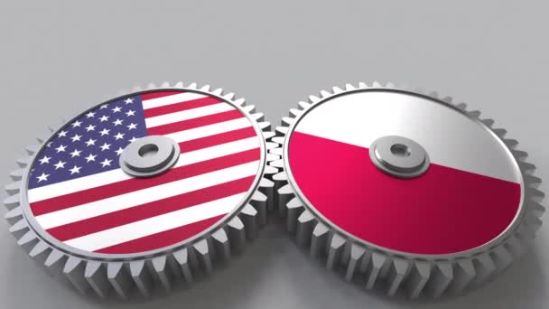 Vlajky Usa a Polska o záběru ozubených kol. Mezinárodní spolupráce koncepční animace — Stock video