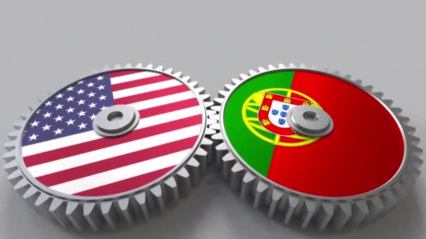 Bandiere degli Stati Uniti e del Portogallo sugli ingranaggi a maglie. Cooperazione internazionale animazione concettuale — Video Stock