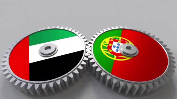 Flags of the UAE and Portugal on meshing gears. International cooperation conceptual animation — Stock Video