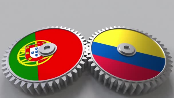 Flaggor av Portugal och Colombia på Meshning gears. Internationellt samarbete konceptuella animation — Stockvideo