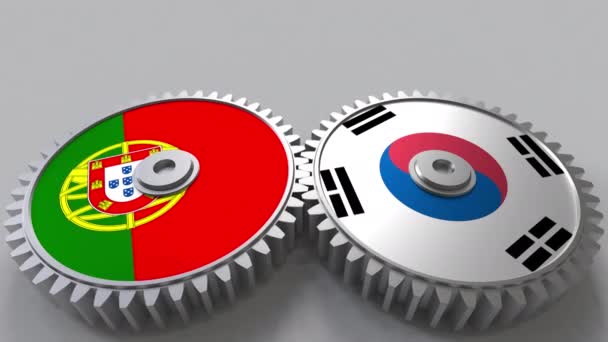 Vlajky z Portugalska a Koreje na záběru ozubených kol. Mezinárodní spolupráce koncepční animace — Stock video