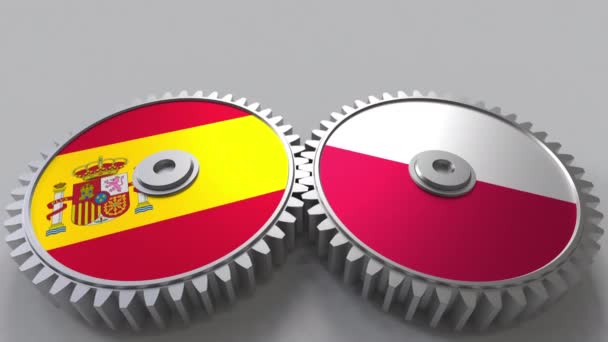 Banderas de España y Polonia en engranajes de malla. Cooperación internacional animación conceptual — Vídeos de Stock