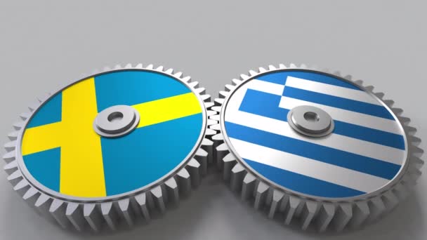 Flags of Sweden and Greece on meshing gears. International cooperation conceptual animation — Stock Video
