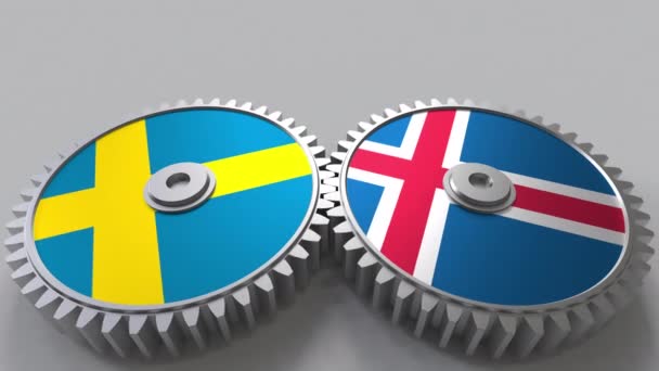 Flags of Sweden and Iceland on meshing gears. International cooperation conceptual animation — Stock Video