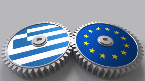 Banderas de Grecia y de la Unión Europea sobre engranajes de malla. Cooperación internacional animación conceptual — Vídeos de Stock