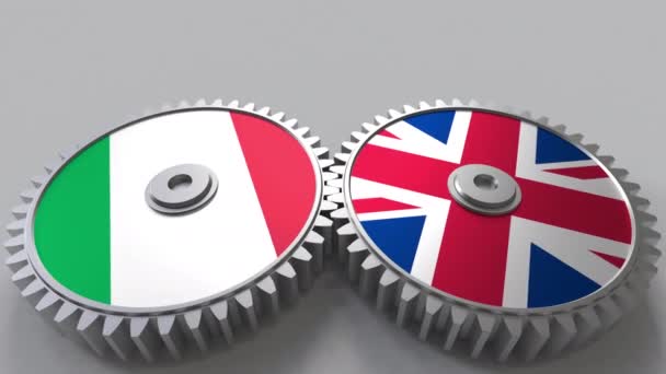 Flags of Italy and The United Kingdom on meshing gears. International cooperation conceptual animation — Stock Video