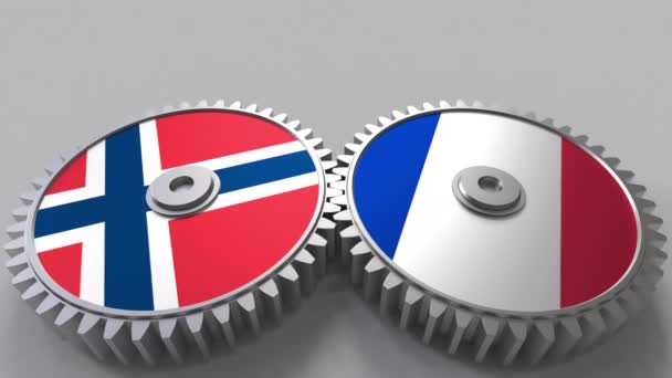 挪威和法国的旗子在啮合齿轮。国际合作概念动画 — 图库视频影像