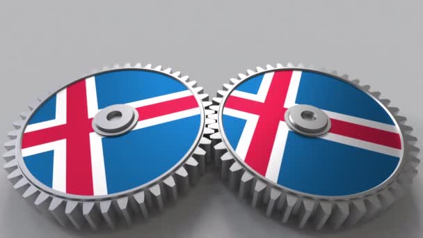 Icelandic national project. Flags of Iceland on moving cogwheels. Conceptual animation — Stock Video