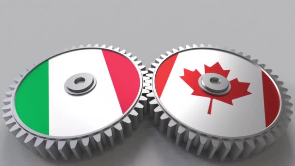 意大利和加拿大在啮合齿轮上的旗帜。国际合作概念动画 — 图库视频影像