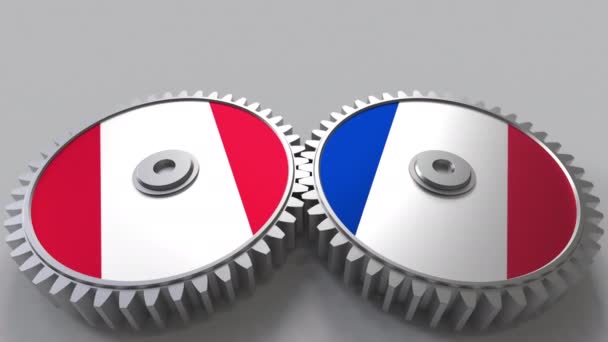 Flags of Peru and France on meshing gears. International cooperation conceptual animation — Stock Video