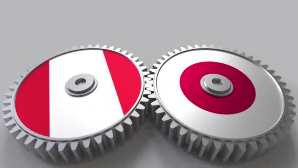 秘鲁和日本在啮合齿轮上的旗帜。国际合作概念动画 — 图库视频影像