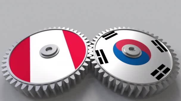 Flaggor i Peru och Korea på Meshning gears. Internationellt samarbete konceptuella animation — Stockvideo