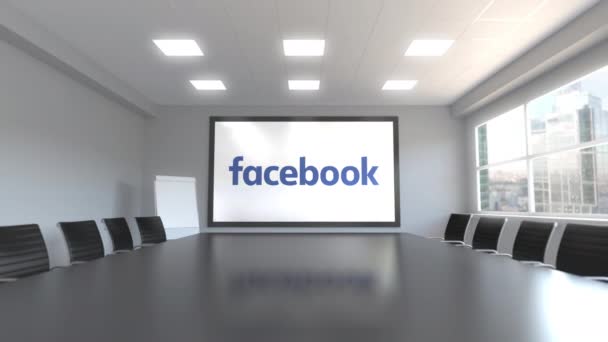 Logo Facebook à l'écran dans une salle de réunion. Animation 3D éditoriale — Video