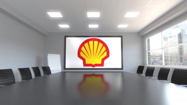 Логотип Shell Oil Company на экране в конференц-зале. Редакционная 3D анимация — стоковое видео