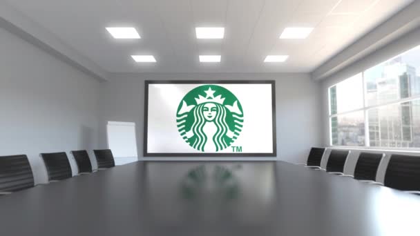 Logo de Starbucks en la pantalla de una sala de reuniones. Animación Editorial 3D — Vídeos de Stock