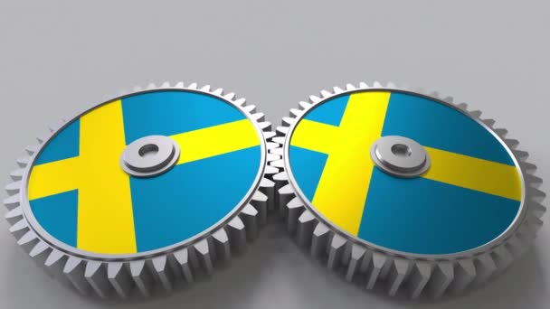 Национальный проект Швеции. Флаги Швеции на движущихся зубчатых колесах. Концептуальная анимация — стоковое видео