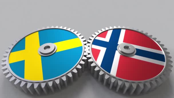 Banderas de Suecia y Noruega en engranajes de malla. Cooperación internacional animación conceptual — Vídeo de stock