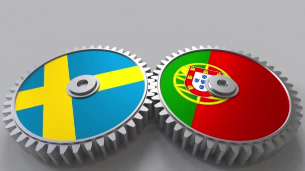 Flaggor för Sverige och Portugal på Meshning gears. Internationellt samarbete konceptuella animation — Stockvideo