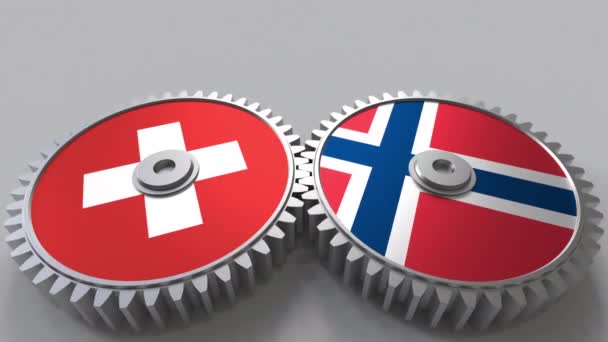 Gears'ı mesh bayrakları İsviçre ve Norveç. Uluslararası işbirliği kavramsal animasyon — Stok video