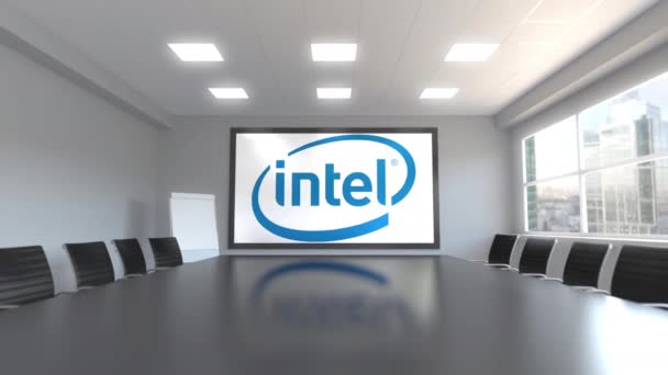 Логотип корпорации Intel на экране в конференц-зале. Редакционная 3D анимация — стоковое видео