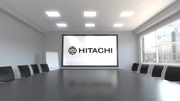 Логотип Hitachi на экране в конференц-зале. Редакционная 3D анимация — стоковое видео