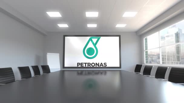 Petroliam Nasional Berhad Logo PETRONAS à l'écran dans une salle de réunion. Animation 3D éditoriale — Video