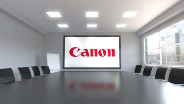Canon Inc.-logotypen på skärmen i ett mötesrum. Redaktionella 3d-animering — Stockvideo