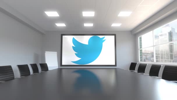 Twitter-Logo auf dem Bildschirm in einem Besprechungsraum. redaktionelle 3D-Animation — Stockvideo