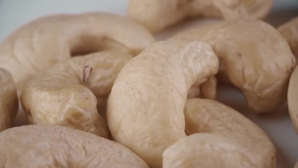 Raw cashews macro shot — Stock Video