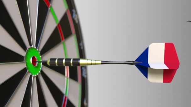 French national achievement. Flags of France on darts hitting bullseye. Conceptual animation — Stock Video