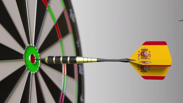 Flags of Canada and Spain on darts hitting bullseye of the target. International cooperation or competition conceptual animation — Stock Video