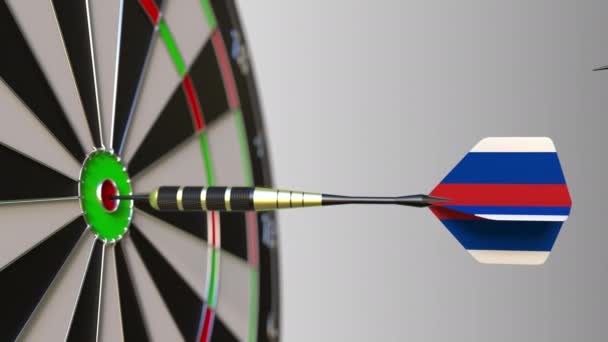 Flags of Australia and Russia on darts hitting bullseye of the target. International cooperation or competition conceptual animation — Stock Video