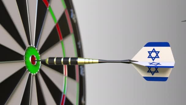 Flags of Australia and Israel on darts hitting bullseye of the target. International cooperation or competition conceptual animation — Stock Video