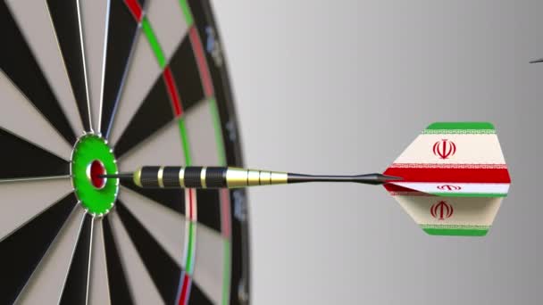 Zászló Ausztrália és Irán a darts ütő telitalálat a cél. Nemzetközi együttműködés, illetve a verseny fogalmi animáció — Stock videók