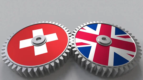 Flaggor i Schweiz och Storbritannien på Meshning gears. Internationellt samarbete konceptuell 3d-rendering — Stockfoto