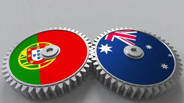 Круглі прапори Португалії і Австралії на сітки gears. Міжнародне співробітництво концептуальні 3d-рендерінг — стокове фото