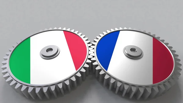 Прапори Італії та Франції на сітки gears. Міжнародне співробітництво концептуальні 3d-рендерінг — стокове фото