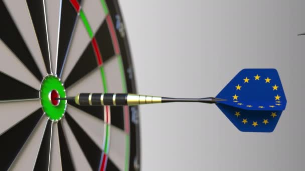 Flags of Japan and the European Union on darts hitting bullseye of the target. International cooperation or competition conceptual animation — Stock Video