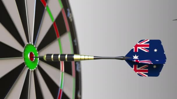 Flags of Iran and Australia on darts hitting bullseye of the target. International cooperation or competition conceptual animation — Stock Video
