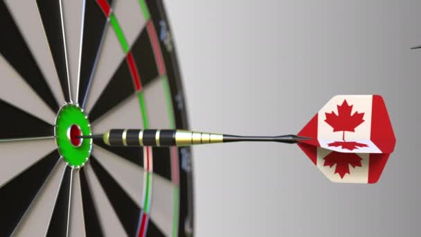 Flags of Syria and Canada on darts hitting bullseye of the target. International cooperation or competition conceptual animation — Stock Video