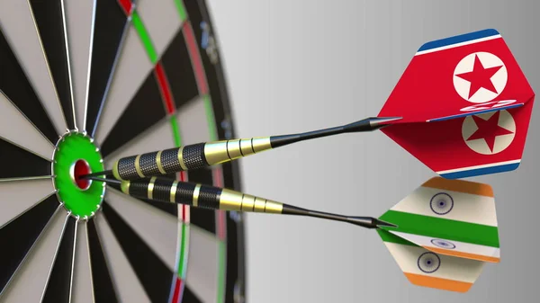 Zászlók, Észak-Korea és India a darts, ütő a cél telitalálat. Nemzetközi együttműködés, illetve a verseny fogalmi 3d-leképezés — Stock Fotó