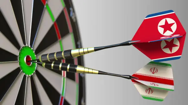 Zászlók, Észak-Korea és Irán a darts, ütő a cél telitalálat. Nemzetközi együttműködés, illetve a verseny fogalmi 3d-leképezés — Stock Fotó