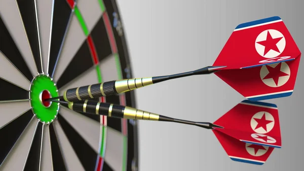 Koreai nemzeti eredménynek. Zászlók, Észak-Korea a darts üti a telitalálat. Konceptuális 3d-leképezés — Stock Fotó