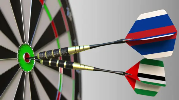 Oroszország és az Egyesült Arab Emírségekben a darts ütő telitalálat a cél. Nemzetközi együttműködés, illetve a verseny fogalmi 3d-leképezés — Stock Fotó