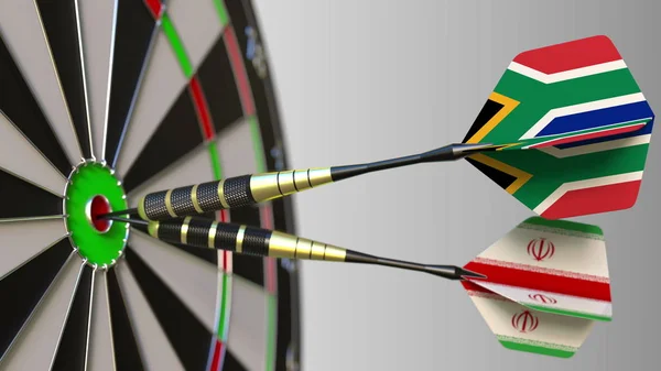 Zászlók, Dél-afrikai Köztársaság és Irán a darts, ütő a cél telitalálat. Nemzetközi együttműködés, illetve a verseny fogalmi 3d-leképezés — Stock Fotó