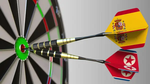 İspanya ve Kuzey Kore bayrakları hedef isabet bullseye Dart. Uluslararası işbirliği ya da rekabet kavramsal 3d render — Stok fotoğraf