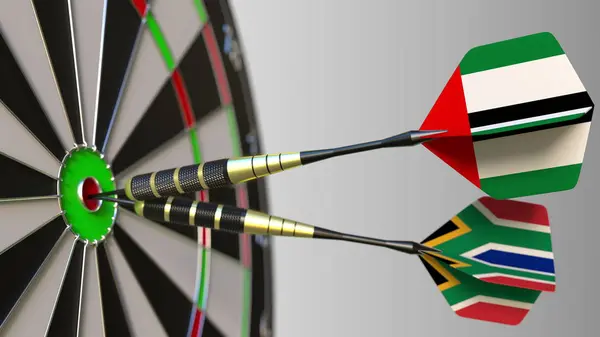 Birleşik Arap Emirlikleri ve Güney Afrika bayrakları hedef isabet bullseye Dart. Uluslararası işbirliği ya da rekabet kavramsal 3d render — Stok fotoğraf