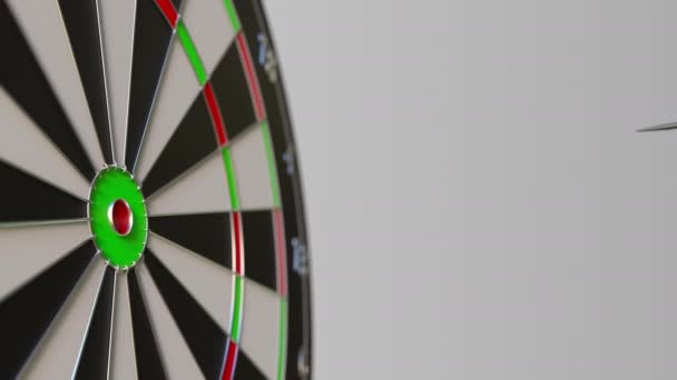 Dart featuring flag of Croatia hits bullseye of the target. Sports or political success related conceptual animation — Stock Video