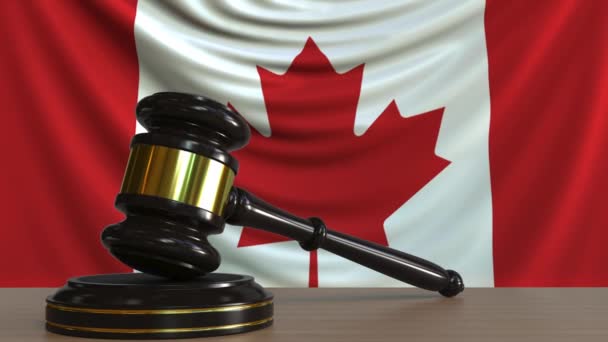 Judges gavel and block against the flag of Canada. Canadian court conceptual animation — Stock Video